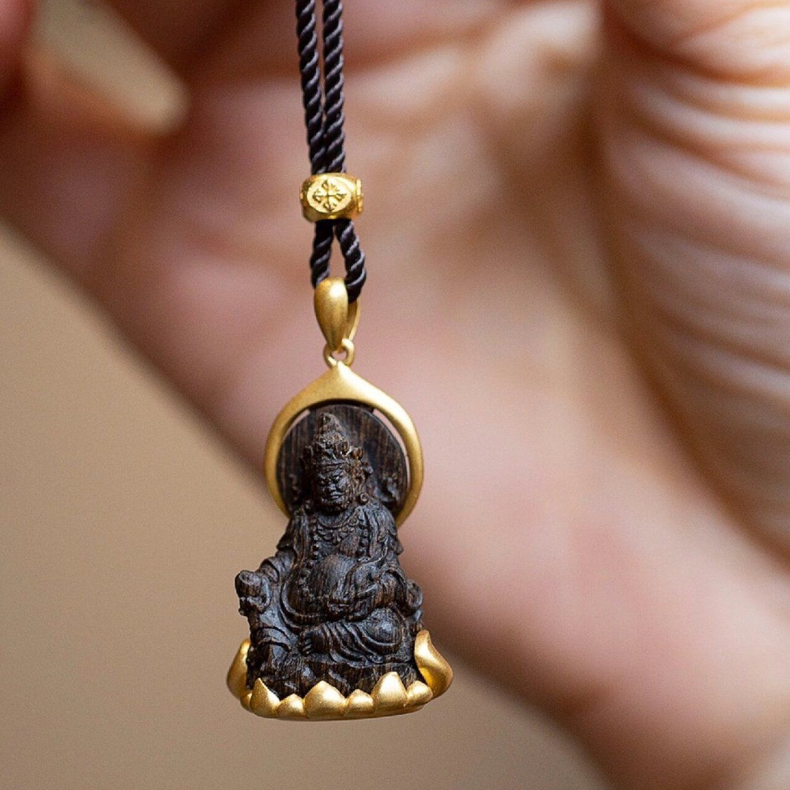 Ethnic Fashion Meaning - Yellow God of Wealth Pendant Meaning